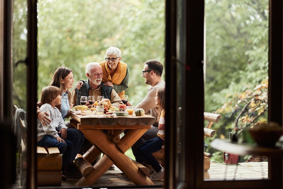 People enjoying a meal together outside
