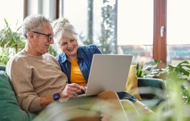 Couple reviewing their long-term financial plans together